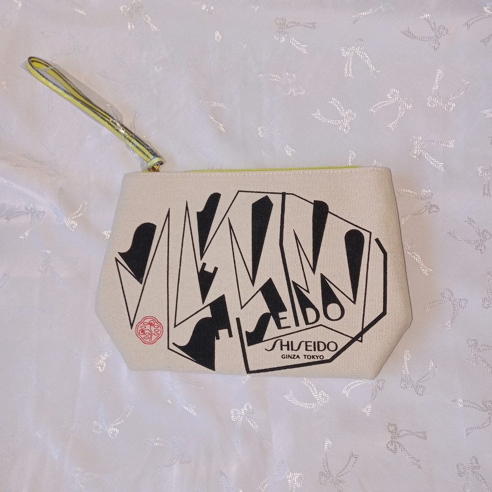 Shiseido canvas cosmetic/wristlet bag